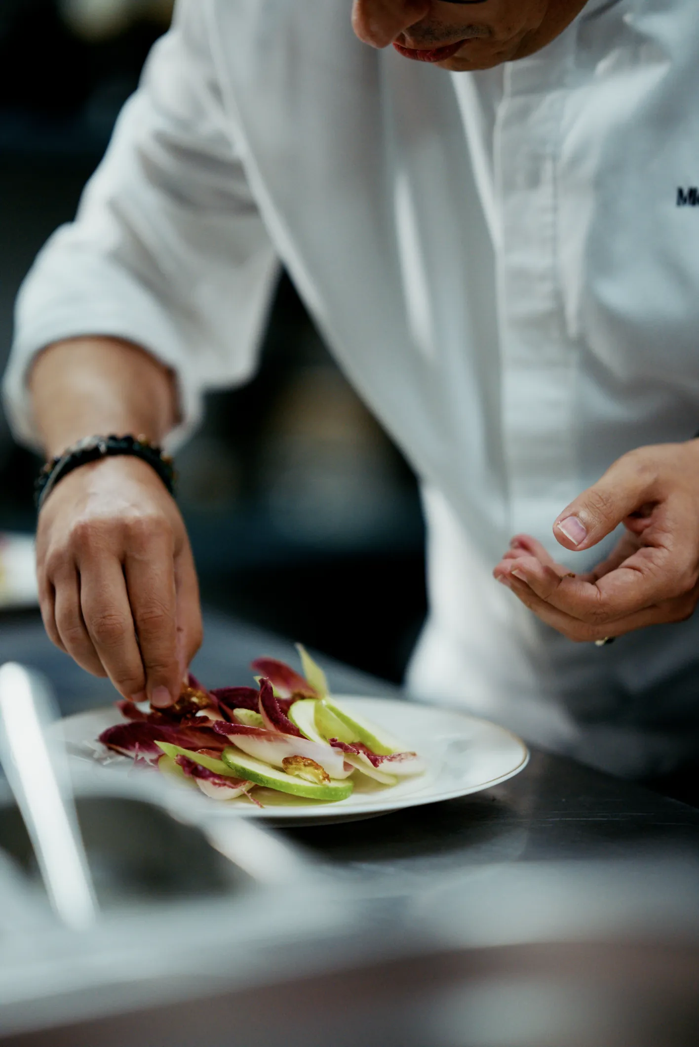 Chef plating a starter